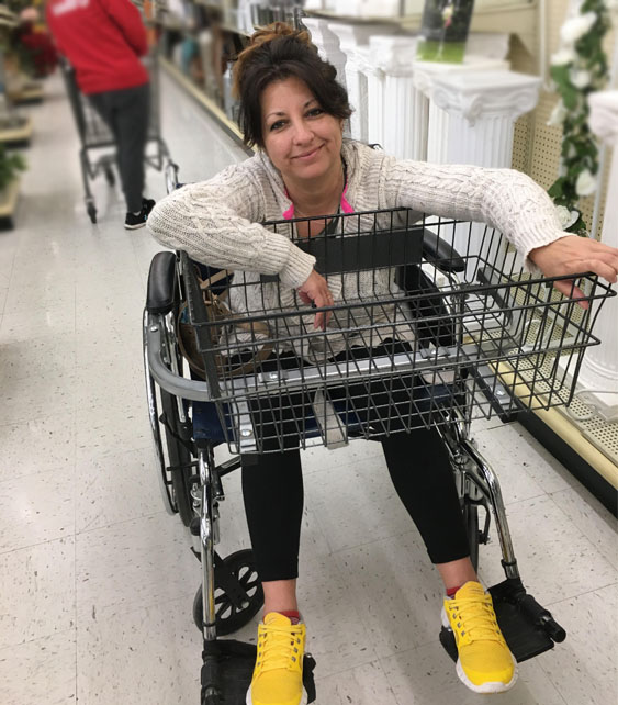 Michelle in a wheelchair